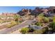 Luxury home with a long driveway and beautiful mountain views at 5655 N Camelback Canyon Dr, Phoenix, AZ 85018