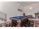 Pool table is centrally located in this large entertainment space at 5655 N Camelback Canyon Dr, Phoenix, AZ 85018