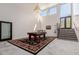 Entertainment room features a pool table and a tall window view at 5655 N Camelback Canyon Dr, Phoenix, AZ 85018