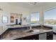 Gourmet kitchen with stainless steel appliances and mountain views at 5655 N Camelback Canyon Dr, Phoenix, AZ 85018