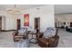 Spacious living room featuring leather armchairs and natural light at 5655 N Camelback Canyon Dr, Phoenix, AZ 85018