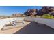 Rooftop patio area featuring chaise lounges, open sky and mountain views at 5655 N Camelback Canyon Dr, Phoenix, AZ 85018