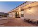 Covered patio with outdoor seating overlooking natural landscaping and beautiful mountain views at 5655 N Camelback Canyon Dr, Phoenix, AZ 85018