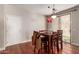 Cozy dining area with a wooden table and access to a patio at 5856 E Hampton Ave, Mesa, AZ 85206