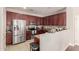 Spacious kitchen with stainless steel appliances and ample cabinetry at 5856 E Hampton Ave, Mesa, AZ 85206