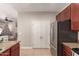 Kitchen boasting ample storage with a large pantry at 5856 E Hampton Ave, Mesa, AZ 85206