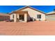 Spacious backyard with patio, grill, and room for toys at 603 W Sierra Vista Dr, Apache Junction, AZ 85120