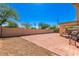 Spacious backyard with patio and block wall at 603 W Sierra Vista Dr, Apache Junction, AZ 85120