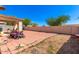 Backyard with patio, providing ample space for outdoor enjoyment at 603 W Sierra Vista Dr, Apache Junction, AZ 85120