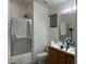 Clean bathroom with shower/tub combo and wood vanity at 603 W Sierra Vista Dr, Apache Junction, AZ 85120