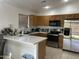 Kitchen with stainless steel appliances and island at 603 W Sierra Vista Dr, Apache Junction, AZ 85120