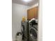 Laundry room with washer, dryer and cabinets at 603 W Sierra Vista Dr, Apache Junction, AZ 85120