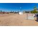 Backyard view with gravel and storage shed at 630 S 93Rd Pl, Mesa, AZ 85208