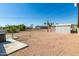 Large backyard with gravel, shed, and chain link fence at 630 S 93Rd Pl, Mesa, AZ 85208