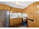 Clean and functional kitchen with ample cabinet space at 630 S 93Rd Pl, Mesa, AZ 85208