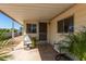 Covered patio with seating area, perfect for relaxing at 630 S 93Rd Pl, Mesa, AZ 85208