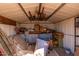 Overfilled storage shed with various items at 630 S 93Rd Pl, Mesa, AZ 85208