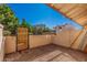 Private backyard with gravel and gate at 6454 E University Dr # 24, Mesa, AZ 85205