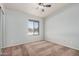 Well-lit bedroom with a window and ceiling fan at 6454 E University Dr # 24, Mesa, AZ 85205