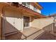 Small patio area with storage unit and access to backyard at 6454 E University Dr # 24, Mesa, AZ 85205