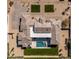 Stunning aerial view of a luxury home showcasing a beautiful pool, and manicured landscaping at 6614 E North Ln, Paradise Valley, AZ 85253