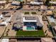 A sprawling property featuring a modern home, sparkling pool, and meticulously maintained grounds at 6614 E North Ln, Paradise Valley, AZ 85253