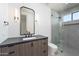 Modern bathroom showcasing a floating vanity, shower, and stylish fixtures at 6614 E North Ln, Paradise Valley, AZ 85253