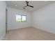 Bright bedroom featuring hardwood floors and a large window at 6614 E North Ln, Paradise Valley, AZ 85253