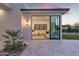 Exterior view into bedroom with access to the backyard patio at 6614 E North Ln, Paradise Valley, AZ 85253