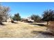 Open green space with landscaping and trees at 6808 S 36Th Dr, Phoenix, AZ 85041