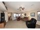 Spacious living room with a fireplace and sliding glass doors at 6808 S 36Th Dr, Phoenix, AZ 85041