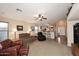 Living room with an open floor plan and a view of the kitchen at 6808 S 36Th Dr, Phoenix, AZ 85041