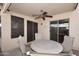 Covered patio with seating area and ceiling fan at 6808 S 36Th Dr, Phoenix, AZ 85041