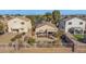 Aerial view showcasing the home's backyard, patio, and surrounding landscape at 6863 E Haven Ave, Florence, AZ 85132