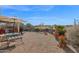 Spacious backyard with gravel, desert plants, and seating area at 6863 E Haven Ave, Florence, AZ 85132