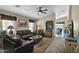 Open living room featuring leather furniture and a southwestern style at 6863 E Haven Ave, Florence, AZ 85132