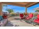 Relaxing covered patio overlooking the backyard at 6863 E Haven Ave, Florence, AZ 85132