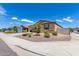 House with a welcoming front yard and walkway at 7110 E Gamebird Way, San Tan Valley, AZ 85143