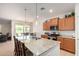 Modern kitchen featuring granite countertops and an island at 7110 E Gamebird Way, San Tan Valley, AZ 85143