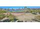 Scenic view of golf course, lake, and mountains at 7275 N Scottsdale Rd # 1001, Paradise Valley, AZ 85253