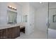 Bathroom with marble tile, modern vanity, and spacious shower at 7275 N Scottsdale Rd # 1001, Paradise Valley, AZ 85253