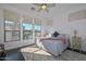 Bright bedroom with a king-size bed and large windows at 7275 N Scottsdale Rd # 1001, Paradise Valley, AZ 85253