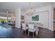 Elegant dining room featuring a rustic wood table and crystal chandelier at 7275 N Scottsdale Rd # 1001, Paradise Valley, AZ 85253