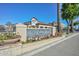 Community entrance with attractive landscaping and signage at 7275 N Scottsdale Rd # 1001, Paradise Valley, AZ 85253