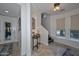 Bright entryway, featuring a staircase and window seat at 7275 N Scottsdale Rd # 1001, Paradise Valley, AZ 85253