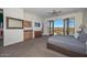 Spacious main bedroom with mountain views and private access to balcony at 7275 N Scottsdale Rd # 1001, Paradise Valley, AZ 85253