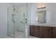 Walk-in shower with glass enclosure and multiple shower heads at 7275 N Scottsdale Rd # 1001, Paradise Valley, AZ 85253