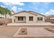 House exterior showcasing backyard patio and landscaping at 7846 W Adam Ave, Peoria, AZ 85382