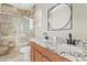 Modern bathroom with granite countertops and a large shower at 7846 W Adam Ave, Peoria, AZ 85382