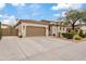 Two-story house with a large driveway and gated entrance at 7846 W Adam Ave, Peoria, AZ 85382